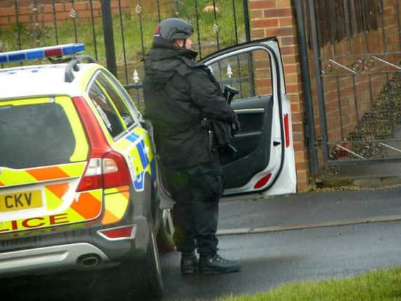 Armed police at an address in Cathedral View in Newbottle, Houghton, on Sunday, March 6, 2016.