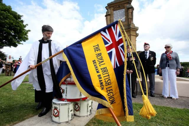The Right Reverend Paul Harrison places the Seaham Royal British Legion Standards on the drumheads ahead of the service during Armed Forces Day event at Seaham Town Park last year.