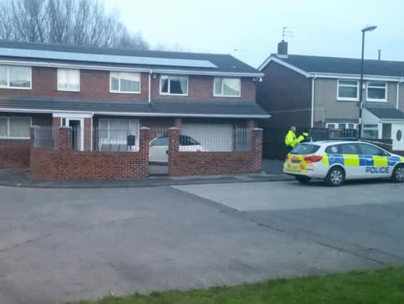 Police at a house in Edgmond Court, Hollycarrside, on Monday, February 29.