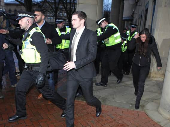 Adam Johnson leaving Bradford Crown Court last Wednesday, with sister Faye pictured right.