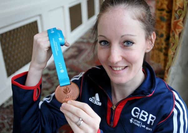 Kat Driscoll with her World Cup bronze medal from Azerbaijan. Picture by Frank Reid