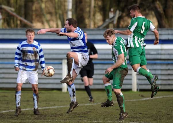 Northern League football action between Chester-le Street Town (blue and white hoops) and Easington Colliery last week