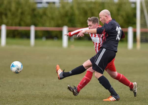 Seaham Red Star Reserves (red/white) take on Ashbrooke Belford House a fortnight ago. Picture by Kevin Brady