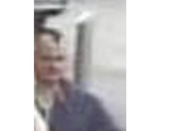 A man police wish to trace in connection with the theft of money from a cash machine in Washington.