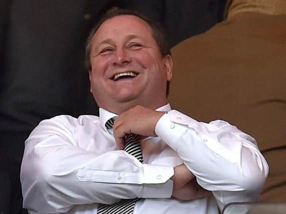 Mike Ashley has been accused of running a 'modern-day sweatshop'.