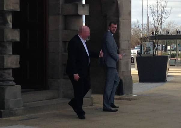 Nyall Stephenson, right, in the grey suit, leaving court.