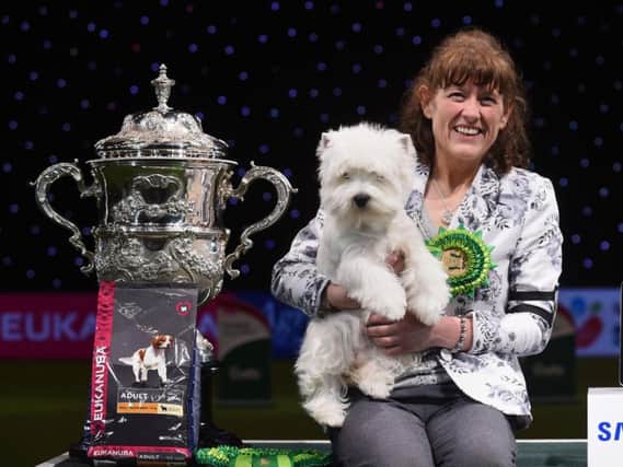 Winning dog Devon and owner Marie Burns.