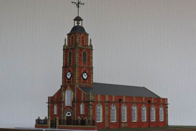 Fred's model featuring how Sunderland's Old Parish Church would have originally looked. The adornments on the tower are removable.
