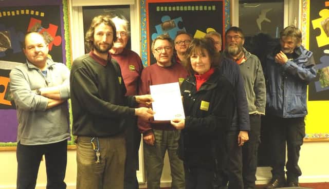 Castle Eden Dene Natural England volunteers with their well-earned Caring for your Environment Award