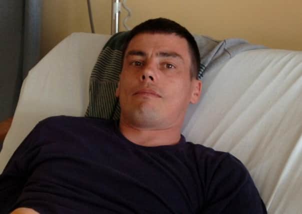 Attacker Martin Cairns after his paragliding accident.
