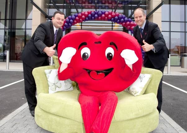 Thumbs up for the money raised from the DFS sofa donation scheme.