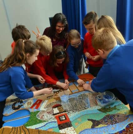 Woodlea Primary School lottery funded mosaic.
Artist Susan Warlock