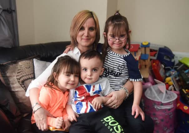 Louise Major, of Ocean View, Ryhope, with daugher Leona Russell (7) who has Down Syndrome. Also pictured are Lexi Russell (4) and Harrison Russell (2).