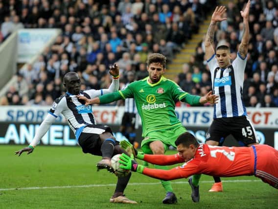 Vito Mannone dives at the feet of Papiss Cisse during today's derby. Pic: Frank Reid.