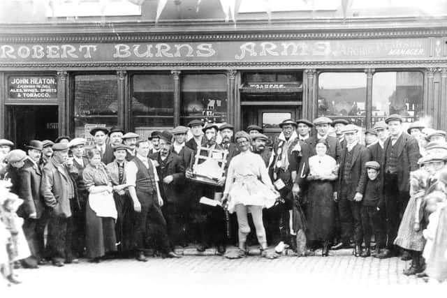 Ready for the East Carnival outside The Robert Burns in 1920s