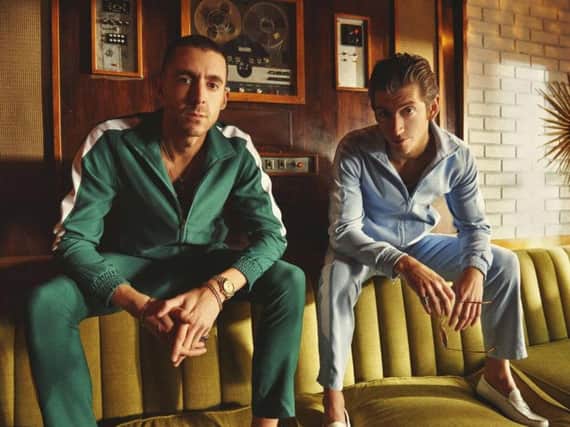 The Last Shadow Puppets are Miles Kane, left, and Alex Turner.