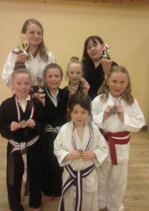 Members of Thorney Close Karate Club with their awards.