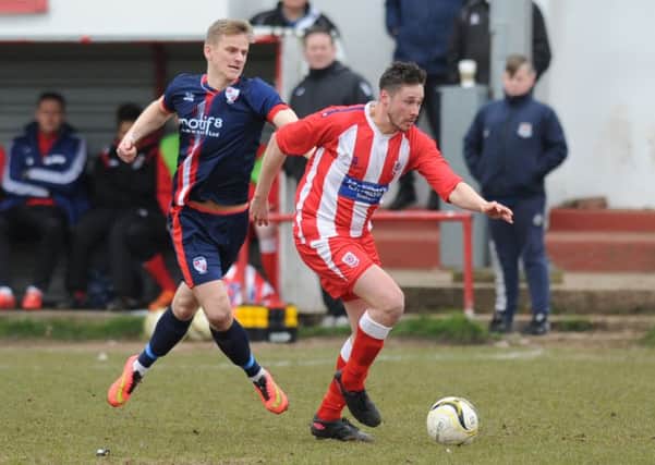 Seaham Red Star (stripes) attack in last week's 2-2 draw with Shildon. Red Star are without a game this weekend. Picture by Tim Richardson.