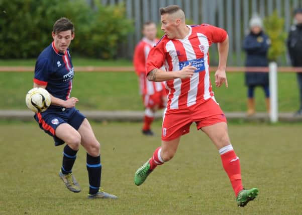 Seaham Red Star (red and white) battle Shildon in the First Division last week. Picture by Tim Richardson