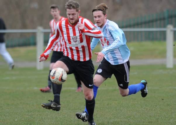 Sunderland West End (red and white strip) take on Silksworth CW last week. Picture by Tim Richardson