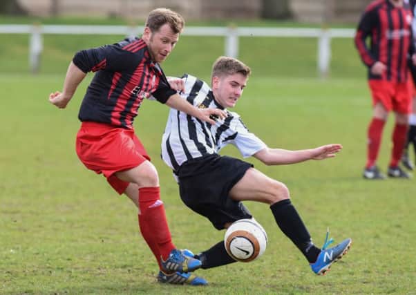 Ashbrooke Belford House (red/black) take on Boldon CA in Saturday's 4-3 thriller. Picture by Kevin Brady
