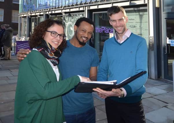 Action Language teacher Maria Figueira from Galicia, Spain, with refugee Berhane Hadera from Eritrea and Julian Prior, chief executive officer of Action Foundation.