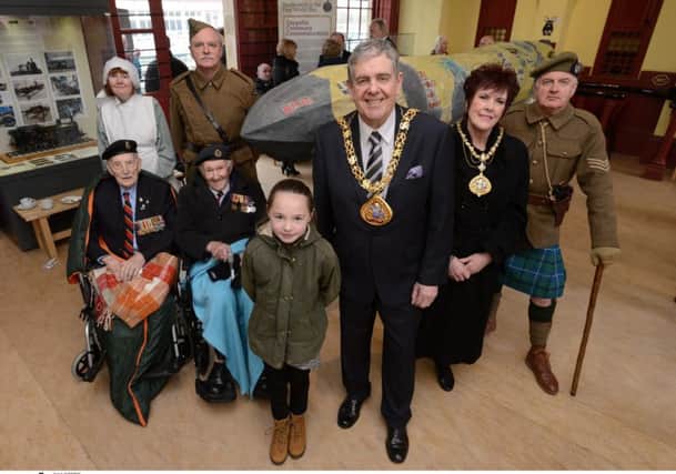 Grange Park Primary School pupil Madison Eastick, 10, with the Mayor and Mayoress of Sunderland, Coun Barry Curran and Carol Curran, at Monkwearmouth Station Museum unveiling a Zeppelin art structure created by children from Grange Park Primary School with, from left to right, Time Bandits members Rosie Serdiville and Tony Hall, World War Two veterans Jack Watson and George Waller, and Time Bandits member John Sadler.