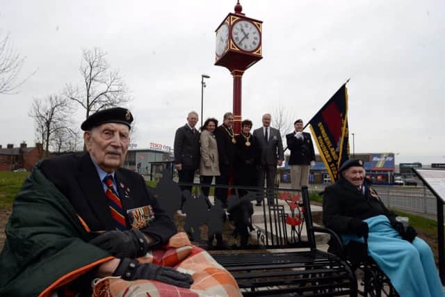 The Mayor and Mayoress of Sunderland, Coun Barry Curran and Carol Curran, unveiling a memorial bench at the Wheatsheaf Green with, from left to right, World War Two veteran Jack Watson, Sunderland Council Deputy Leader and Armed Forces Champion Coun Harry Trueman, Julie Elliott MP, Chairman of Sunderland Armed Forces Network Coun Graham Hall, Coldstream Guards Asc Fred Porter and World War Two veteran George Waller.