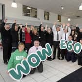 Liz Airey from Macmillan Cancer Suppport with dealer principal Chris Sopp and the staff at Town Centre Citroen.