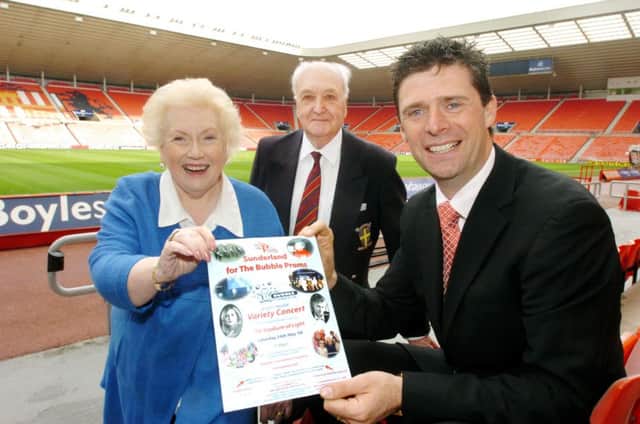 Former SAFC chairman Niall Quinn with Denise and Tom Moffatt from Durham County Cricket Club promoting a charity concert