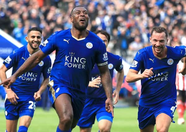 Leicester captain Wes Morgan celebrates