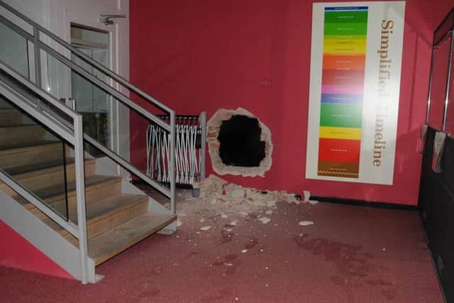 The hole in the wall at Durham Oriental Museum after the raid.