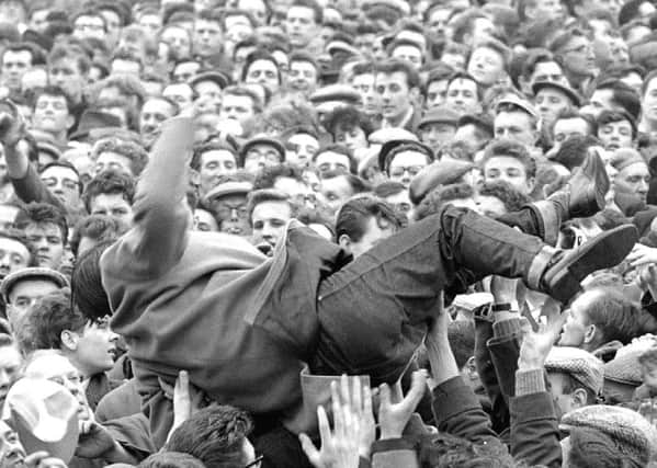 Crowd surfing at Roker Park in the 1960s.