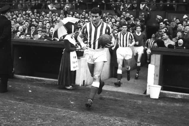 Date: 02/11/2006   Photographer: SE    
BLACK AND WHITE IMAGE OF CHARLIE HURLEY LEADING TEAM FOR CUPTIE AGAINST EVERTON - FEBRUARY 1964 OLD REF SPORT 2 174 picture caption: Charlie Hurley dedicated to the task of leading Sunderland back to the First Divsion, takes out his team for their day of Cup glory at ROKER Park on Saturday, when they proved how well they are equipped for a promotion by handing out a hiding to First Divsion champions, Everton Sunderland Echo Monday February 17 1964