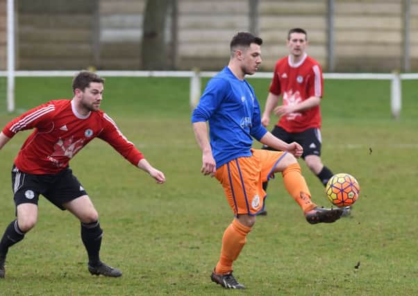 Horden CW (blue) take control against Silksworth CW last week. Picture by Kevin Brady