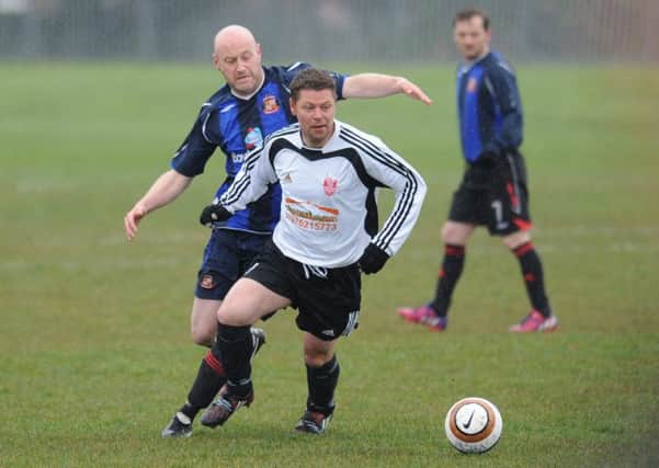 Over-40s football Ironside Cup semi-final action between Mill View SC (blue) and Seaham Marlborough
