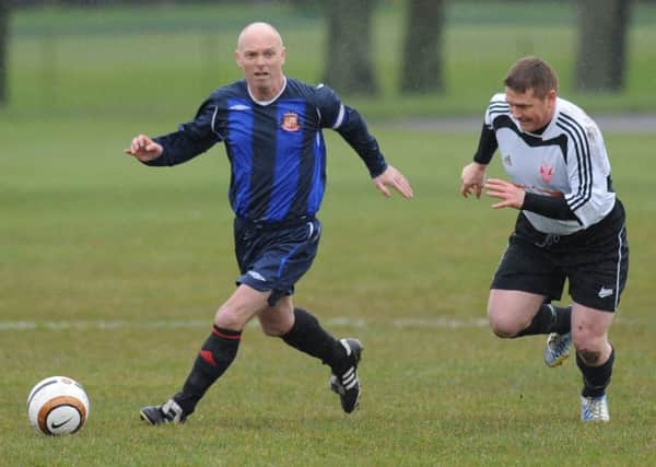 Mill View SC (blue) take on Seaham Marlborough in the Over-40s Ironside Cup semi-final last week