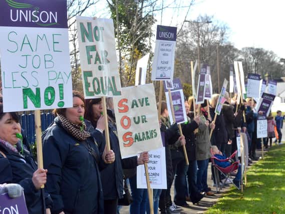 Teaching assistants protest at County Hall.
