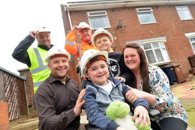 Hope 4 Kidz charity to make adaptation on the home of Duchenne Muscular Dystrophy sufferer Matthew Brettell aged 10
Father Gavin, mother Maria and younger brother Daniel Brettell with Tunstalll workers Brent Ganley and Anthony Scrafton
