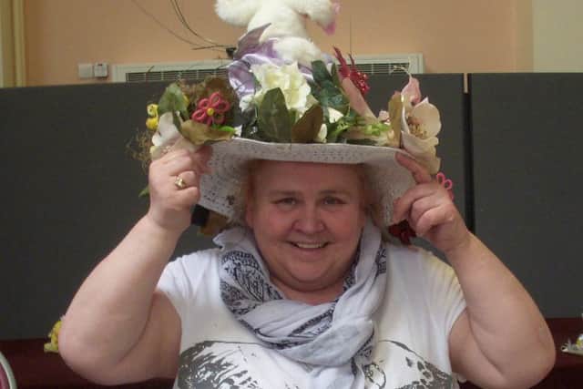Jackie winning the Easter bonnet competition at St Luke's Neighbourhood Centre.