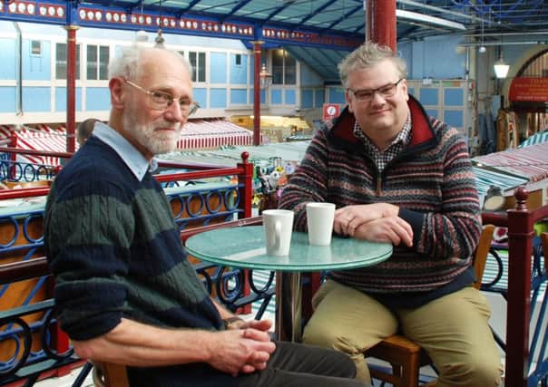 David Butler, left, with Colin Wilkes, managing director of Durham Markets, enjoying the setting of Durham Market Hall.