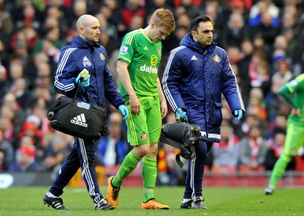 Duncan Watmore limps off at Liverpool. Picture by FRANK REID