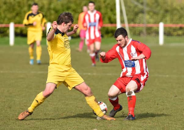 Seaham Red Star (red/white) battle against West Auckland in the First Division last week