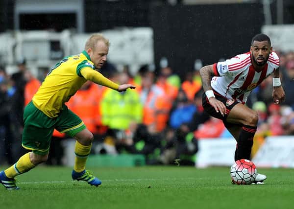 Yann M'Vila in action against Norwich