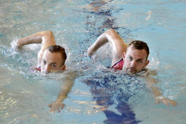 Triathlon twins Michael and David Wallace.
Picture Jane Coltman