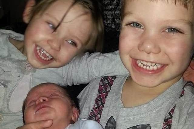 Sophie Allen, pictured with brother Jayden, right, and baby sister Amelia.