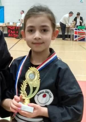 Sophia, from Belmont Karate Club, scooped third place at an NKA competition.