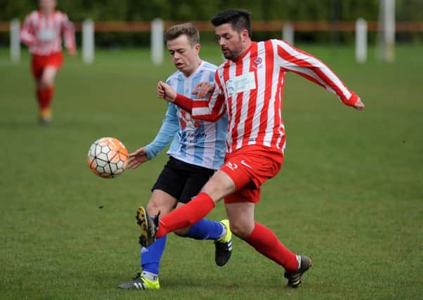 Seaham Red Star Reserves (red and white) battle against Silksworth CW on Saturday