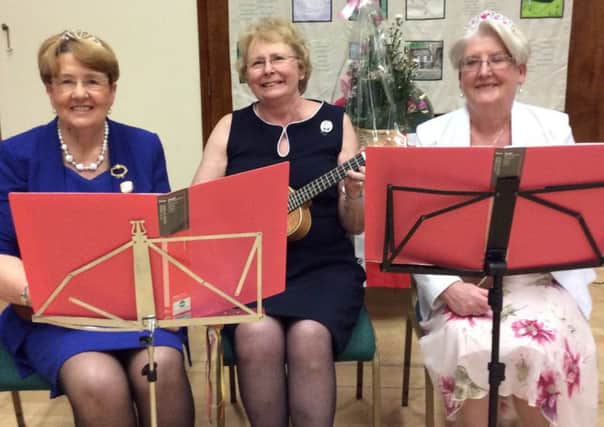 KepierWI members Wendy Clish, Marian Ferguson and Marie Henderson played a selection of favourites on the ukulele at the institute's anniversary meeting.