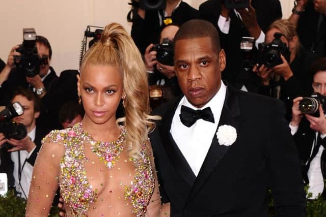 Beyonc pictured with husband Jay Z. Many are speculating that lyrics on the new album, Lemonade, reveal that the rapper has cheated on her during their marriage.